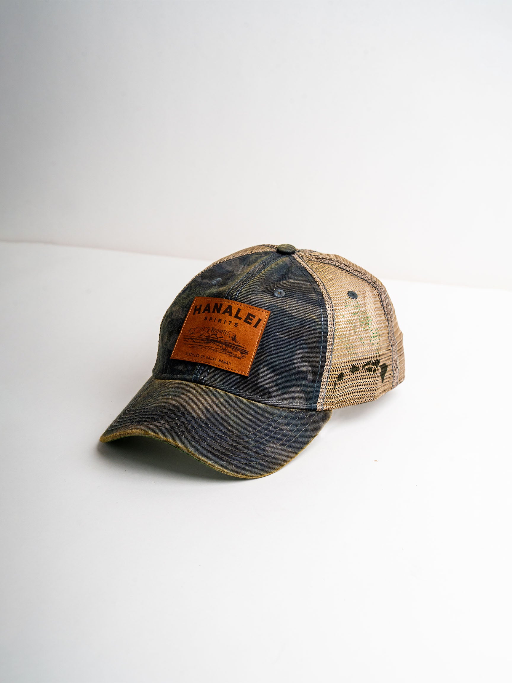 We The Essentials Camo Trucker Hat with Leather Patch